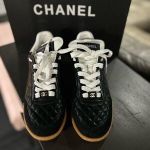 CHANEL Black Quilted Sneakers with White Laces